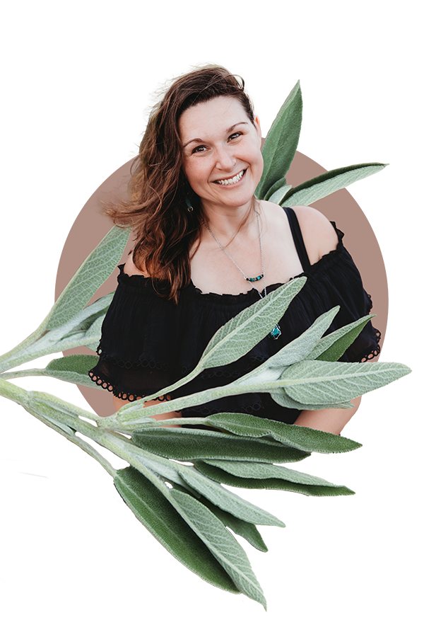 Jenn Bierma surrounded by sage leaves